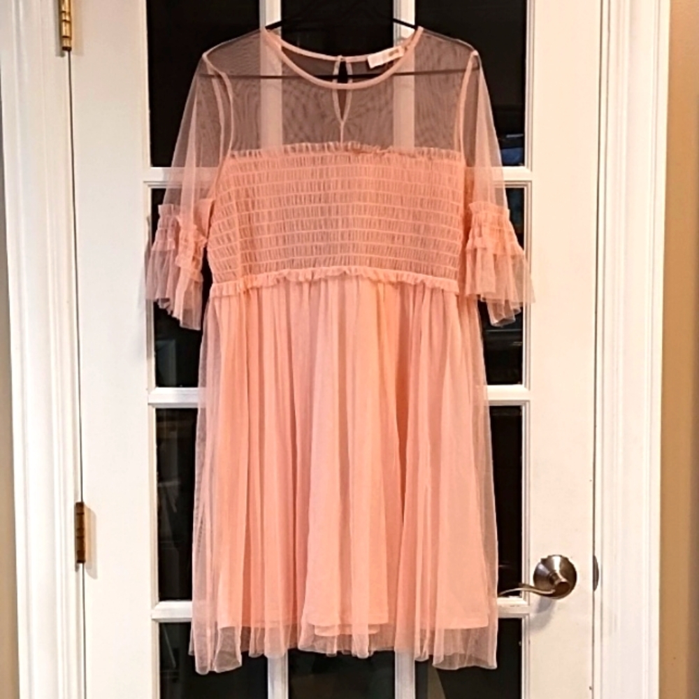 Xtra feminine knee length dress.